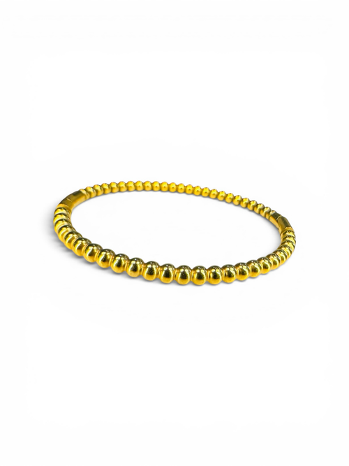 Everlasting Modern Jewelry gold-tone beaded bracelet with small spheres, polished finish, flexible design.